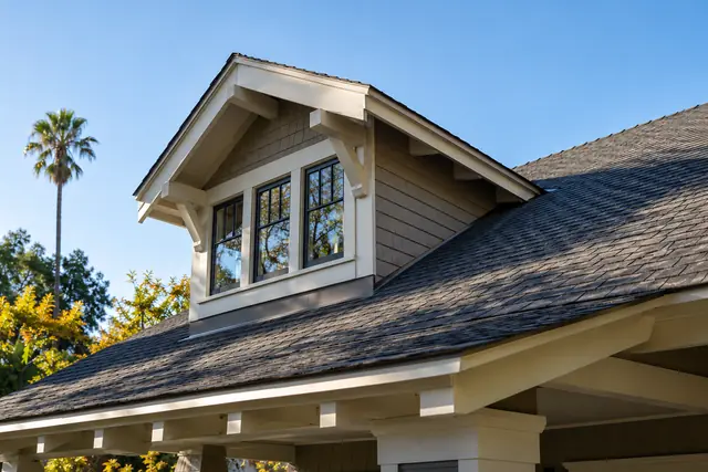 AI-generated illustration: layered asphalt shingles around a Craftsman roof dormer