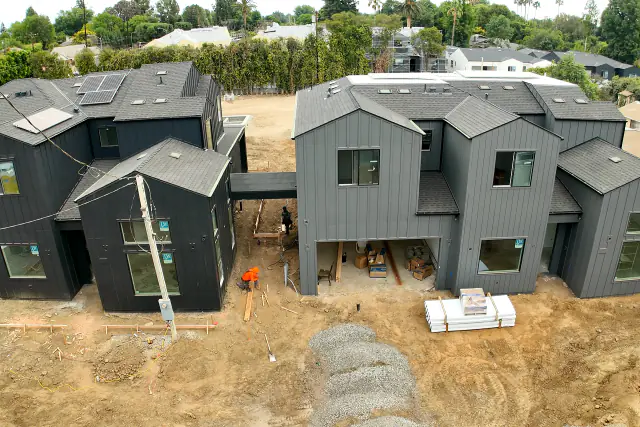 Two new homes on one Northridge lot, joined by a covered breezeway